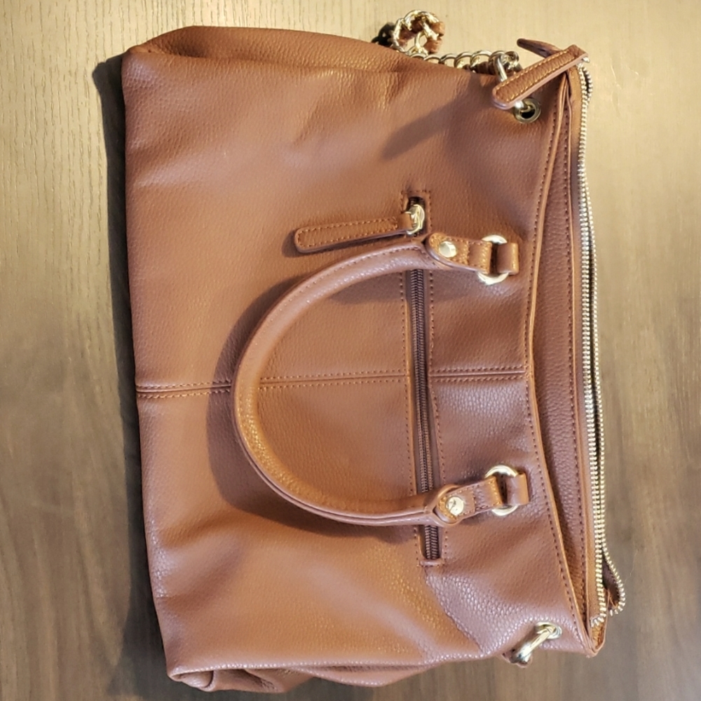 Nwt le chateau brown handbag.